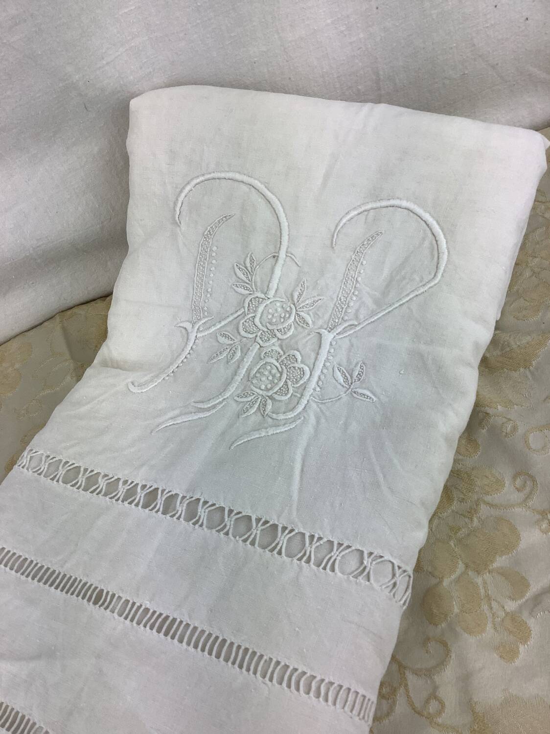 Old linen sheet with monogram embroidery