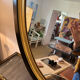 Miroir vintage ovale bois noir et doré