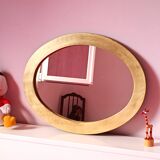 Miroir ovale en bois doré