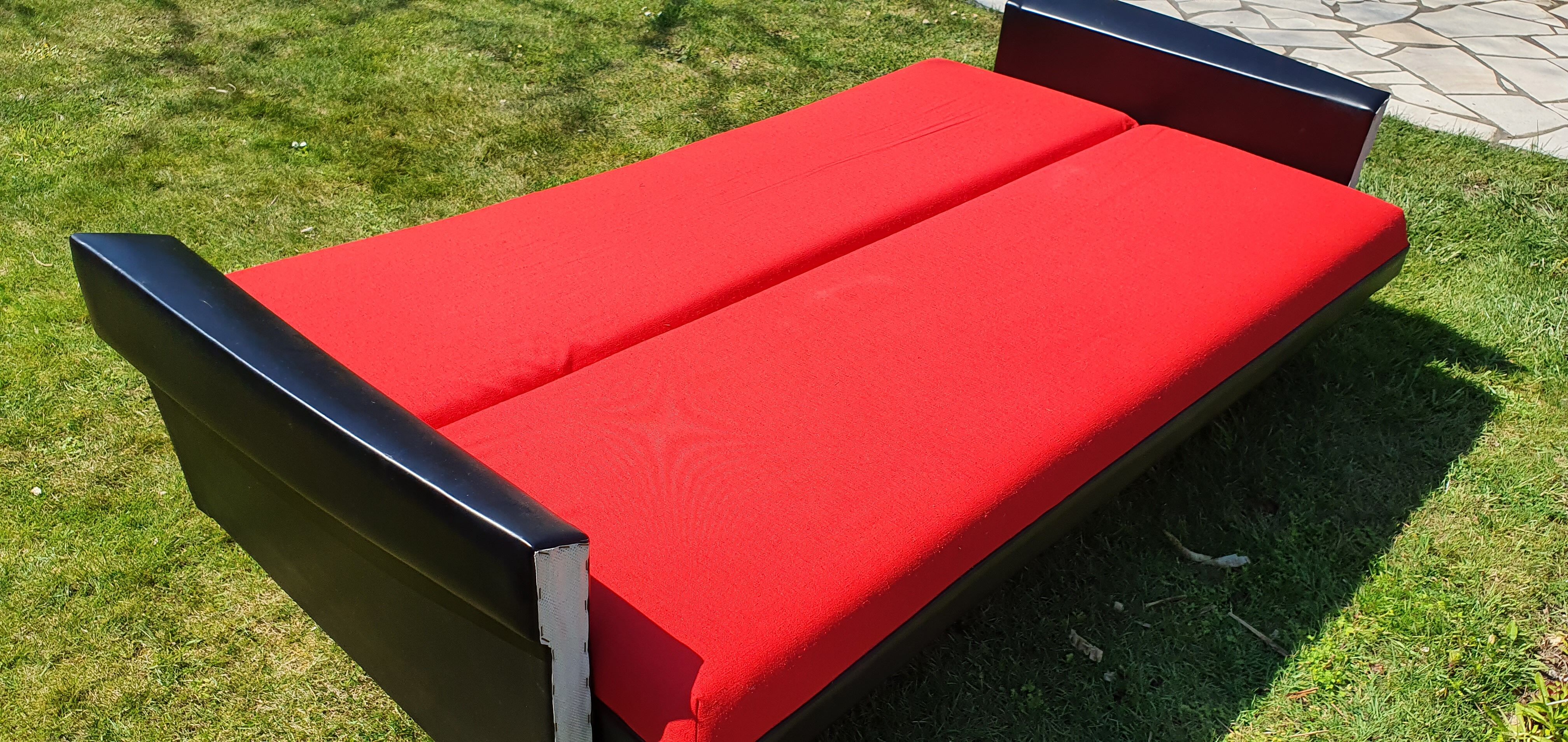 Vintage sofa 3 places convertible, red fabric and black skaï.1960s.