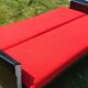 Vintage sofa 3 places convertible, red fabric and black skaï.1960s.