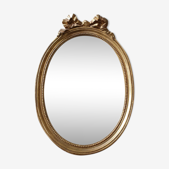 Miroir ovale en bois et stuc 33x49cm