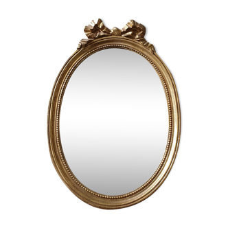 Miroir ovale en bois et stuc 33x49cm
