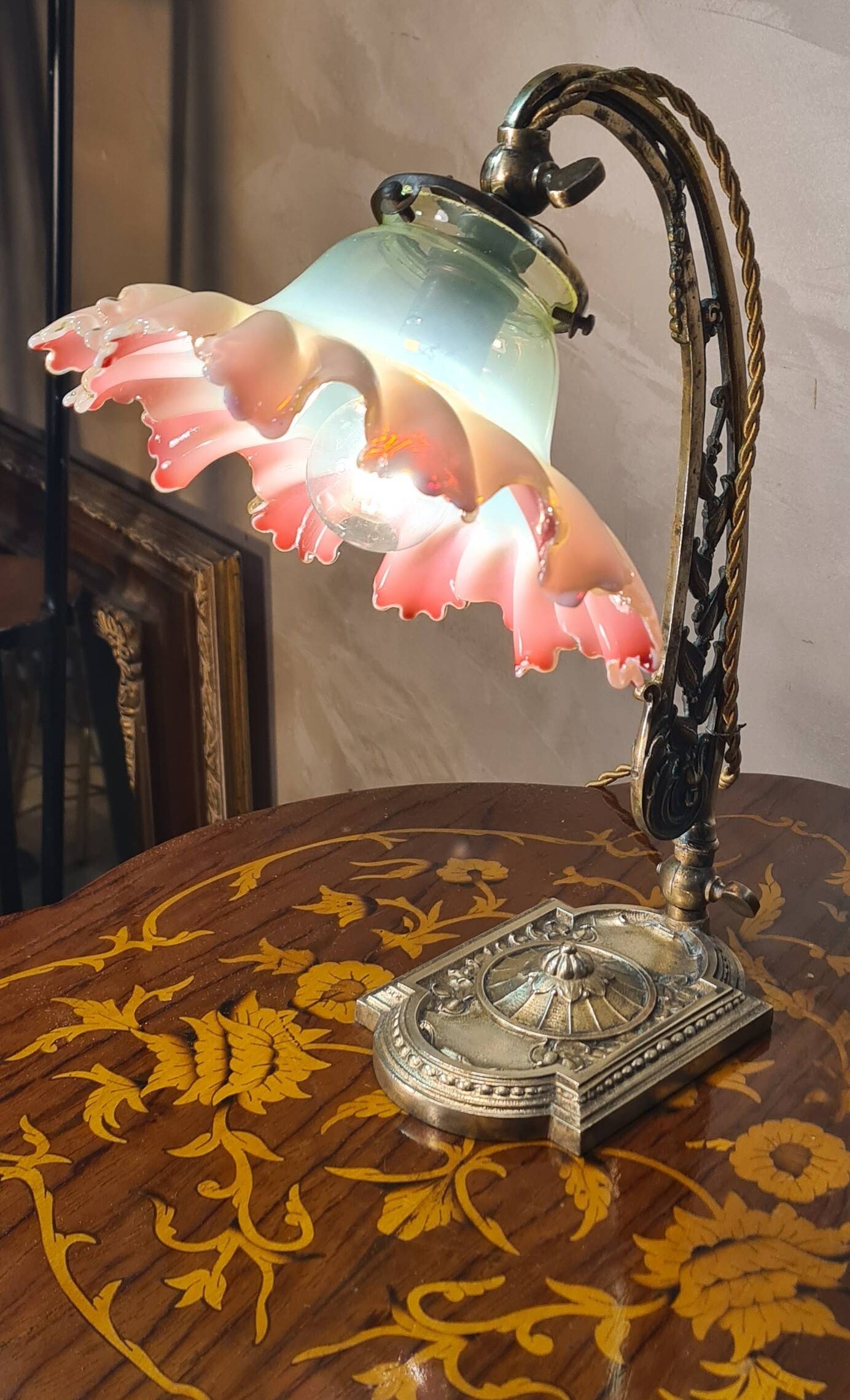 old art nouveau bronze lamp 30x25 with opalescent tulip red interior very rare