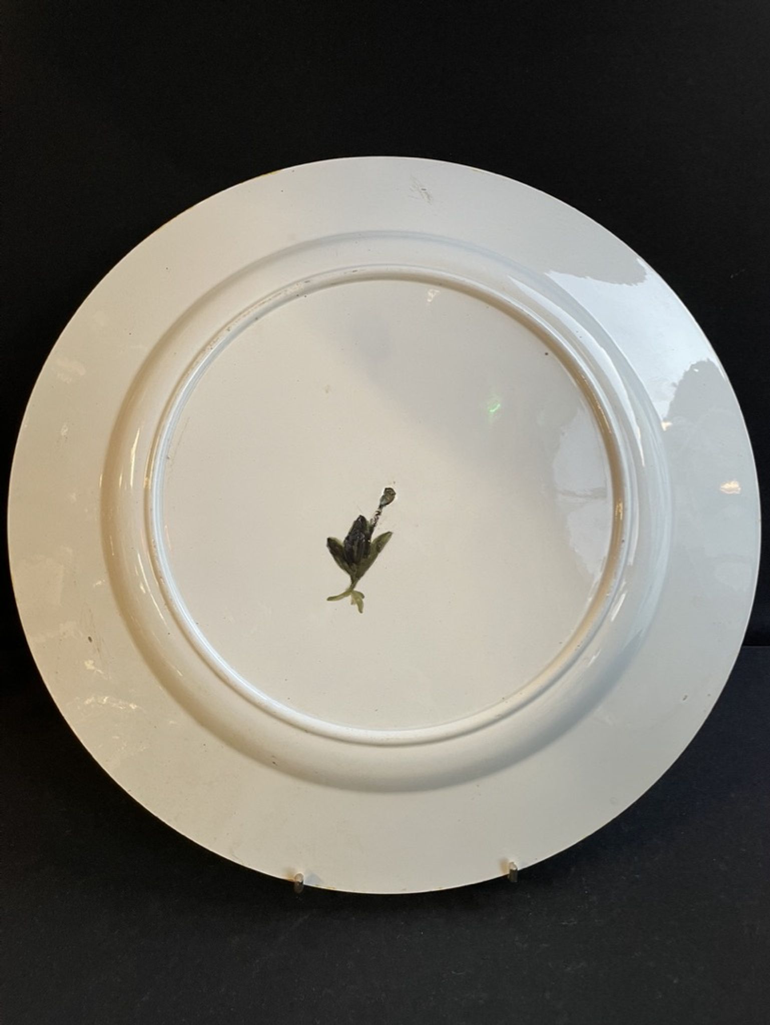 Round earthenware dish - hand decoration signed and marked