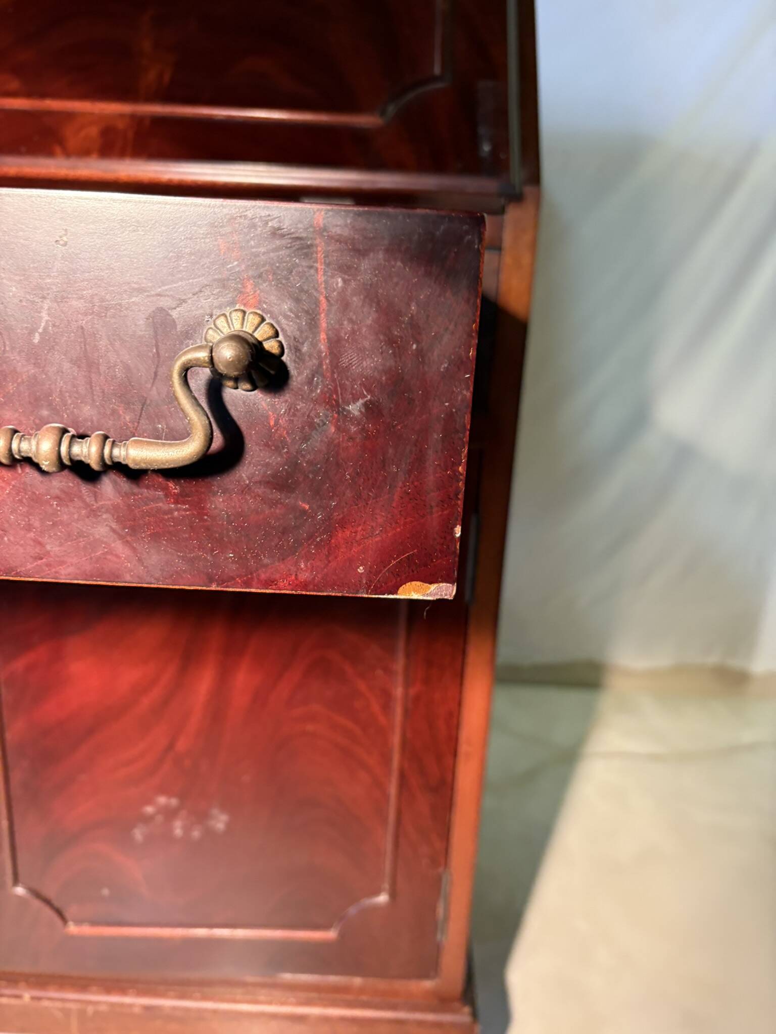 Antique mahogany secretary, upholstered flap and interior storage