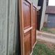 Pair of double-sided communication doors in chestnut with their frame - 20th century