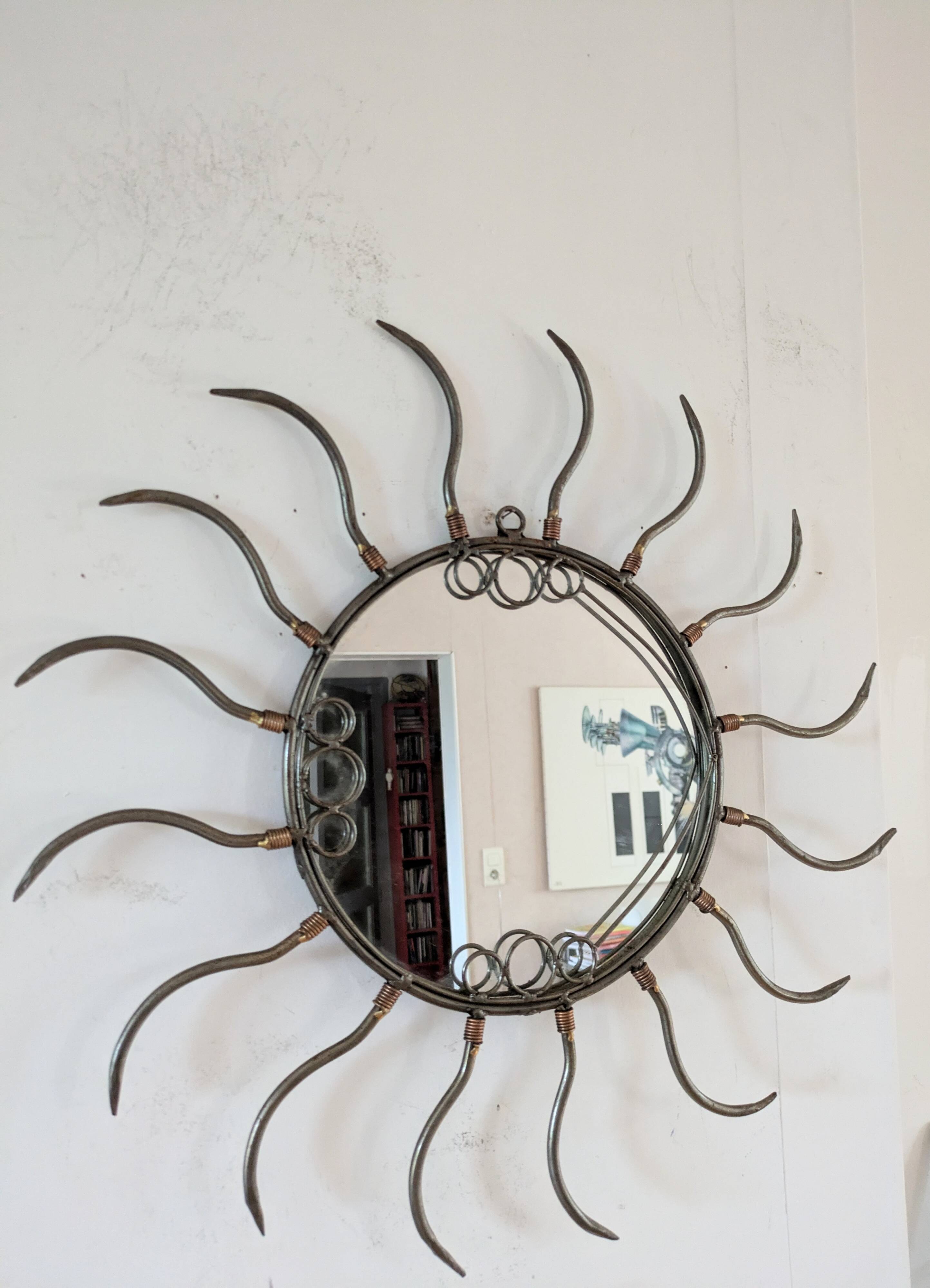 Metal sun mirror