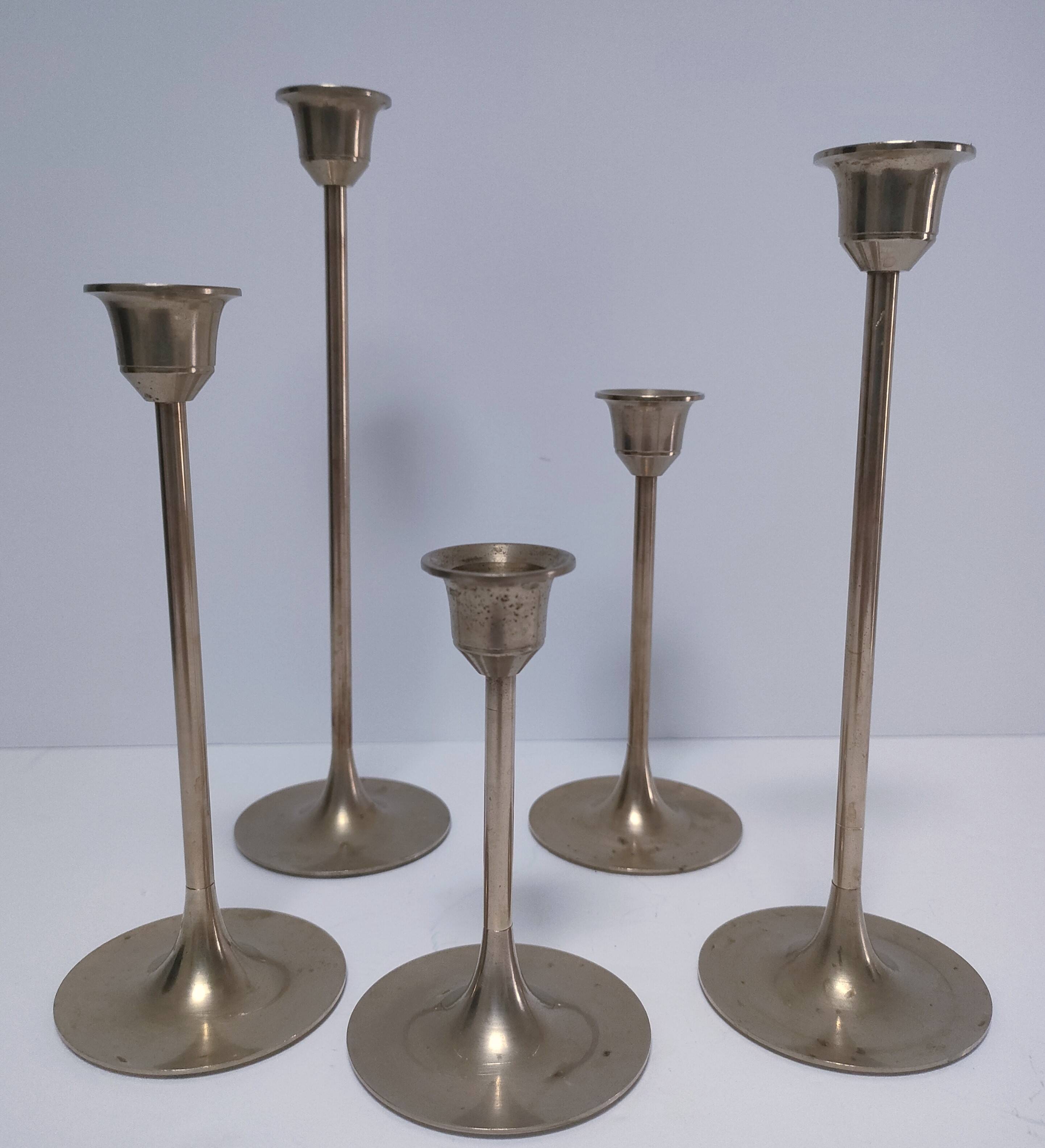 Five vintage Scandinavian design brass candlesticks