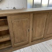 Large row of solid oak loom sliding doors