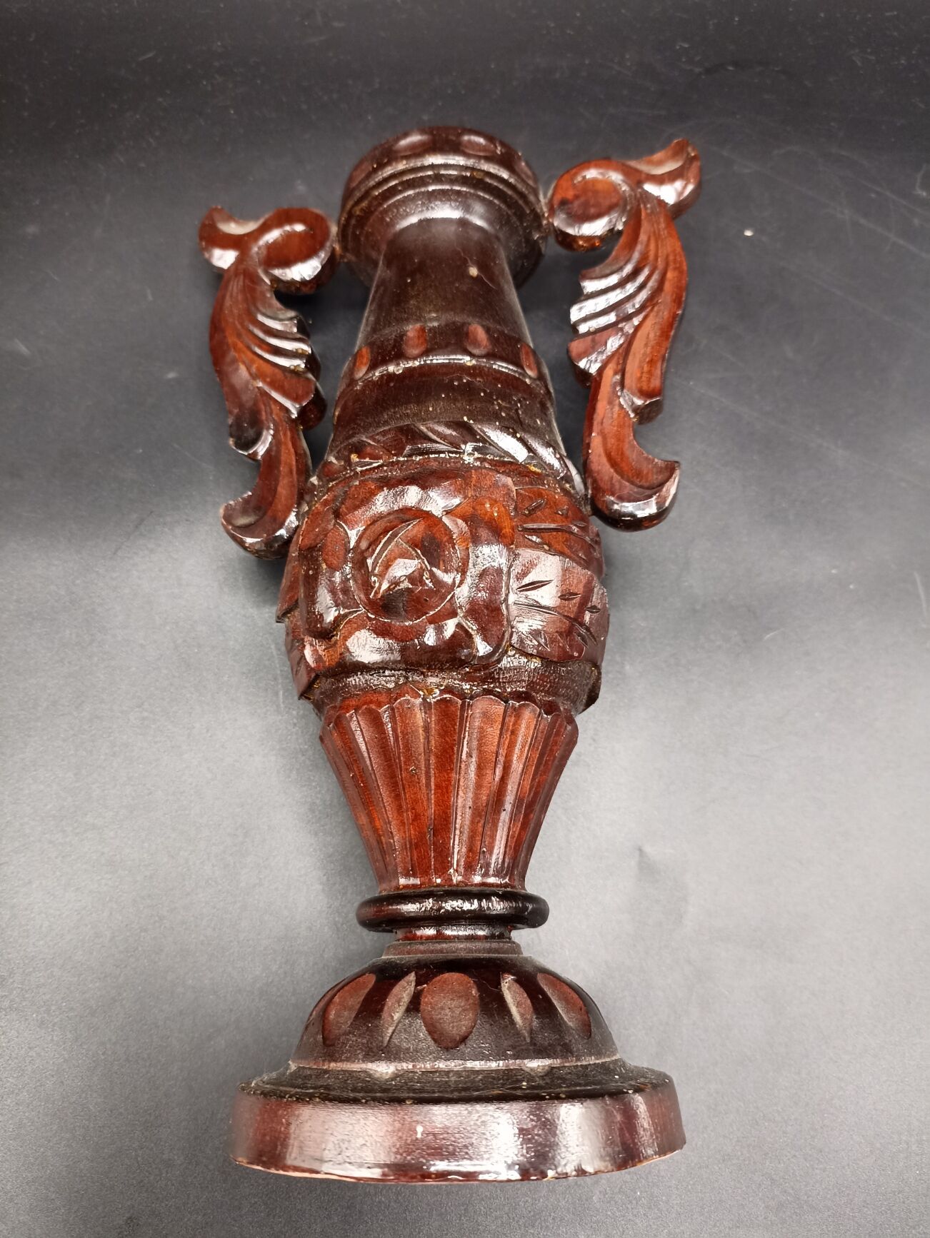 Carved wood amphora vase varnished