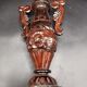 Carved wood amphora vase varnished