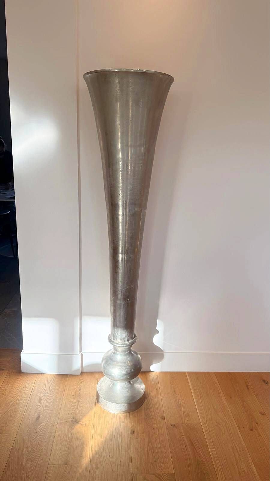 Pair of large silver-plated vases on a stand from Maison de la Literie, 165cm.