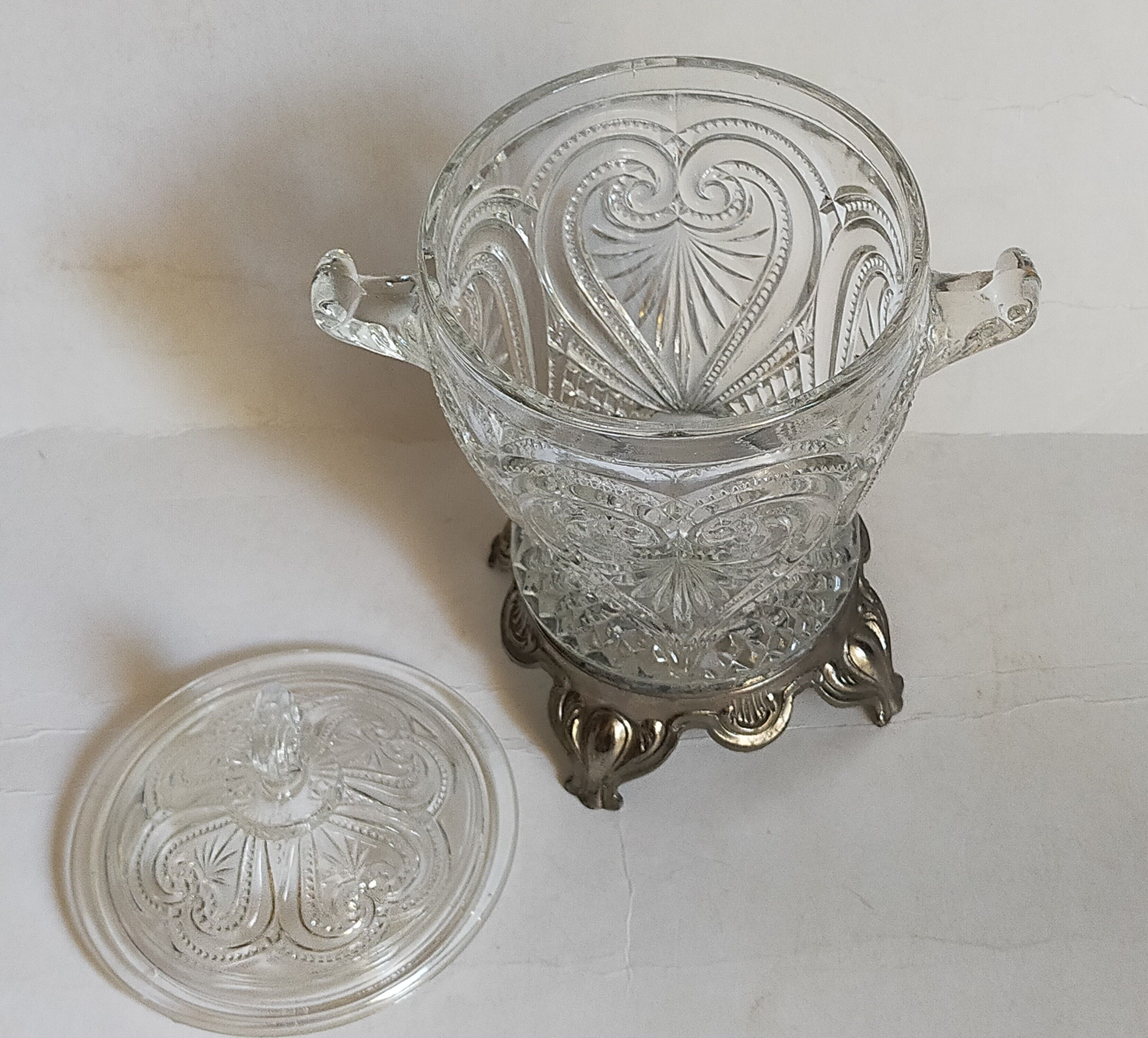 Antique glass compotier on metal stand