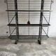 Large Black Powder-Coated Metal Industrial Baker's Rack — Three-Tier Display and Storage Unit, Brass Trim
