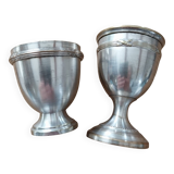 Antique egg cups on silver-plated metal stand