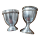 Antique egg cups on silver-plated metal stand