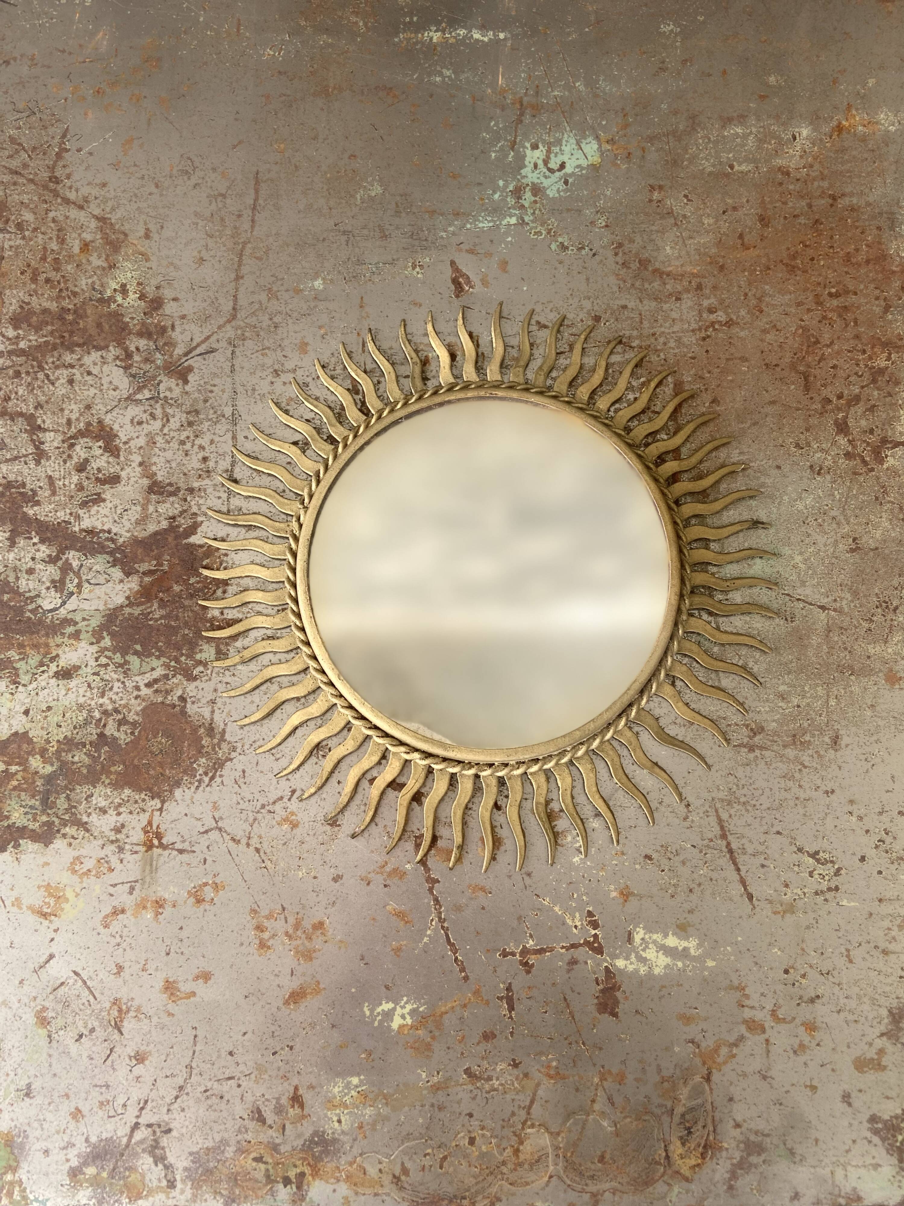Vintage gold metal sun mirror
