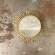 Vintage gold metal sun mirror