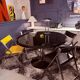 Round dining table, 1980s, black stained wood with glass top