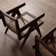 Chaises longues Pierre Jeanneret PJ-SI-29-A en teck et en rotin, années 1950.