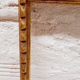 Golden wood frame with godrons