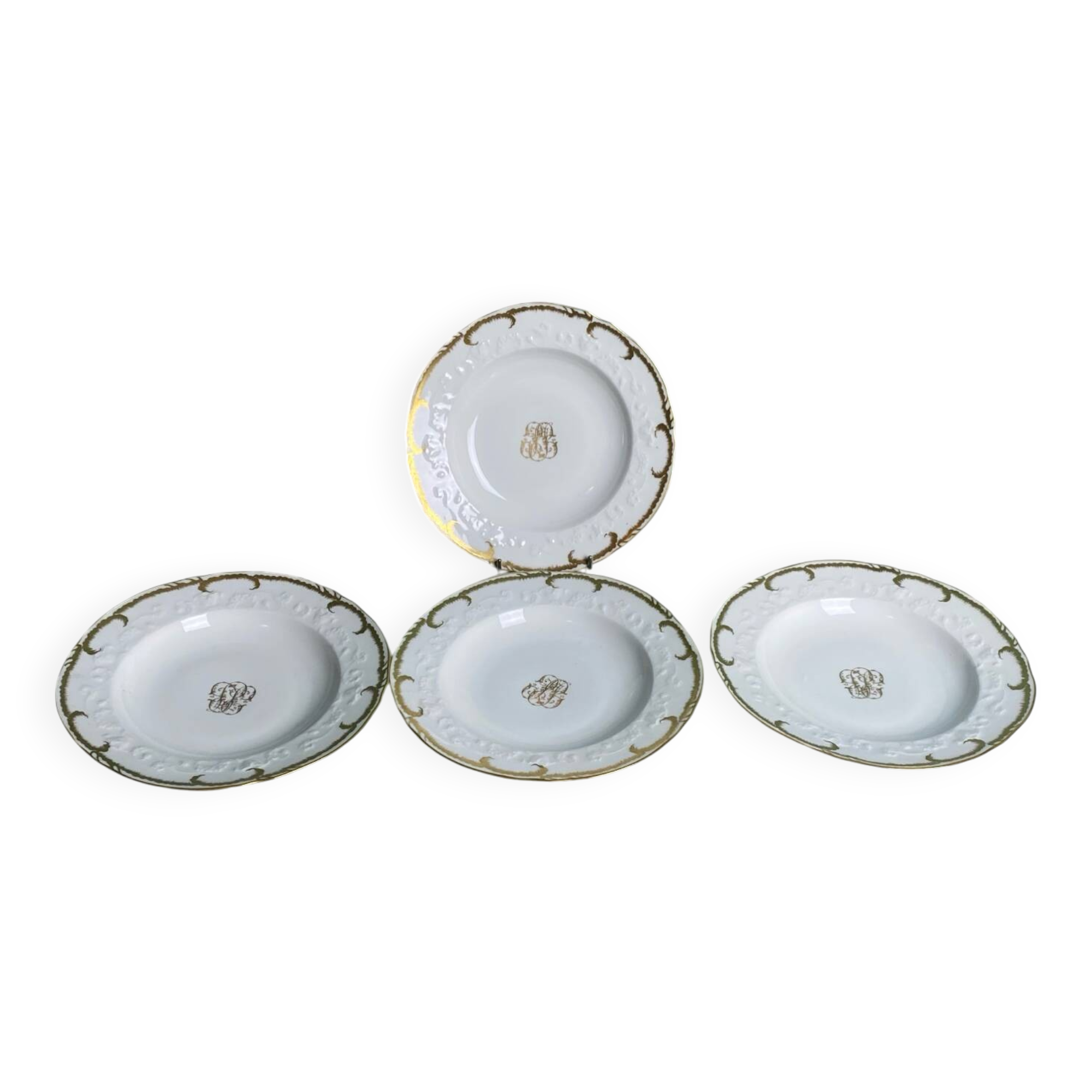 4 deep plates from Limoges with the PJC gold monogram.