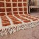Ecru Moroccan rug with geometric patterns 200cm x 270cm.