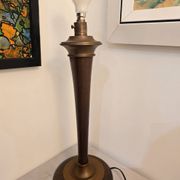 Vintage lamp base in Scandinavian style made of dark wood and bronze metal.