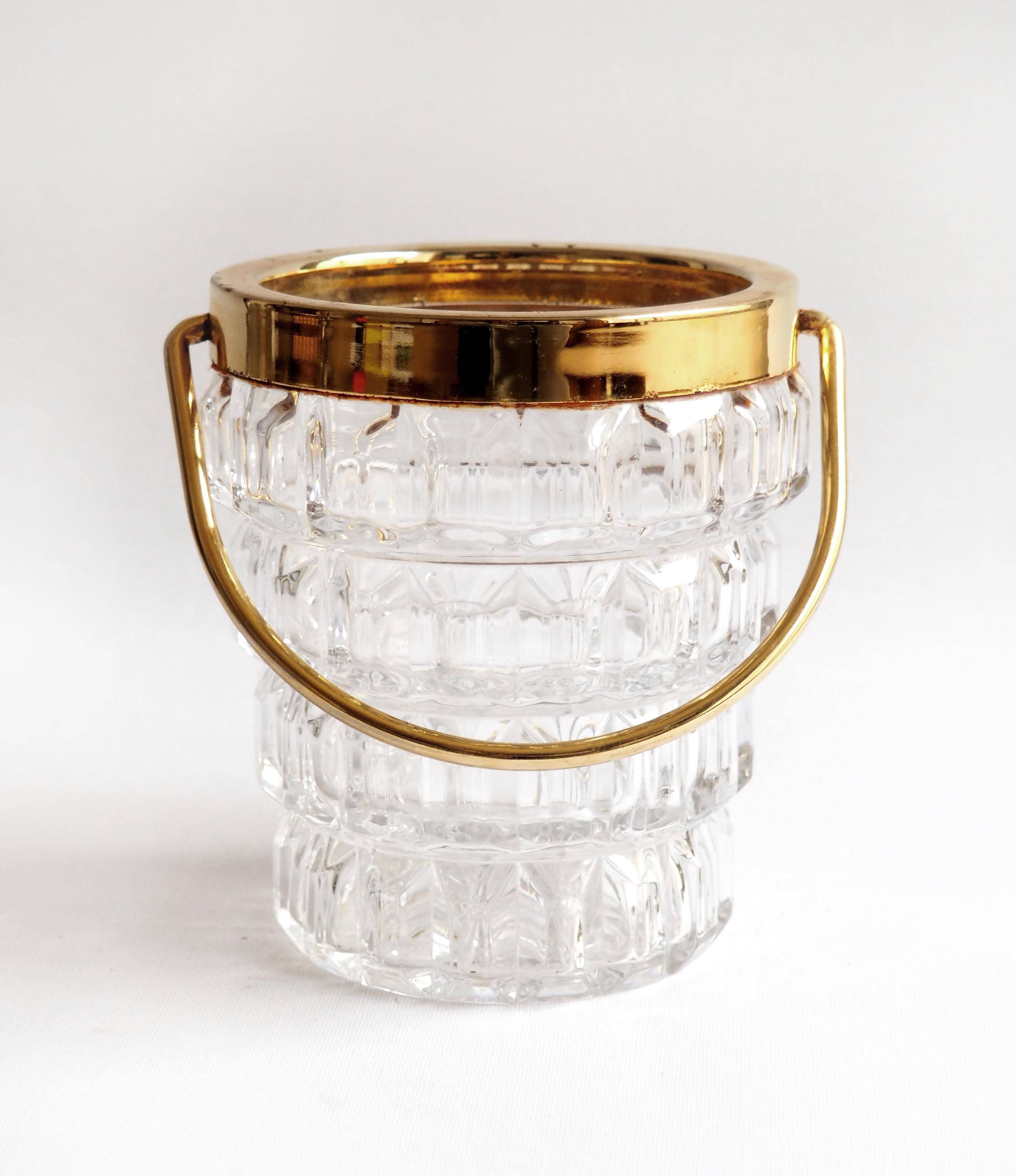 Crystal ice bucket and golden ladle