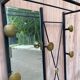 Mid-Century Modern wall coat rack from the 1950s.