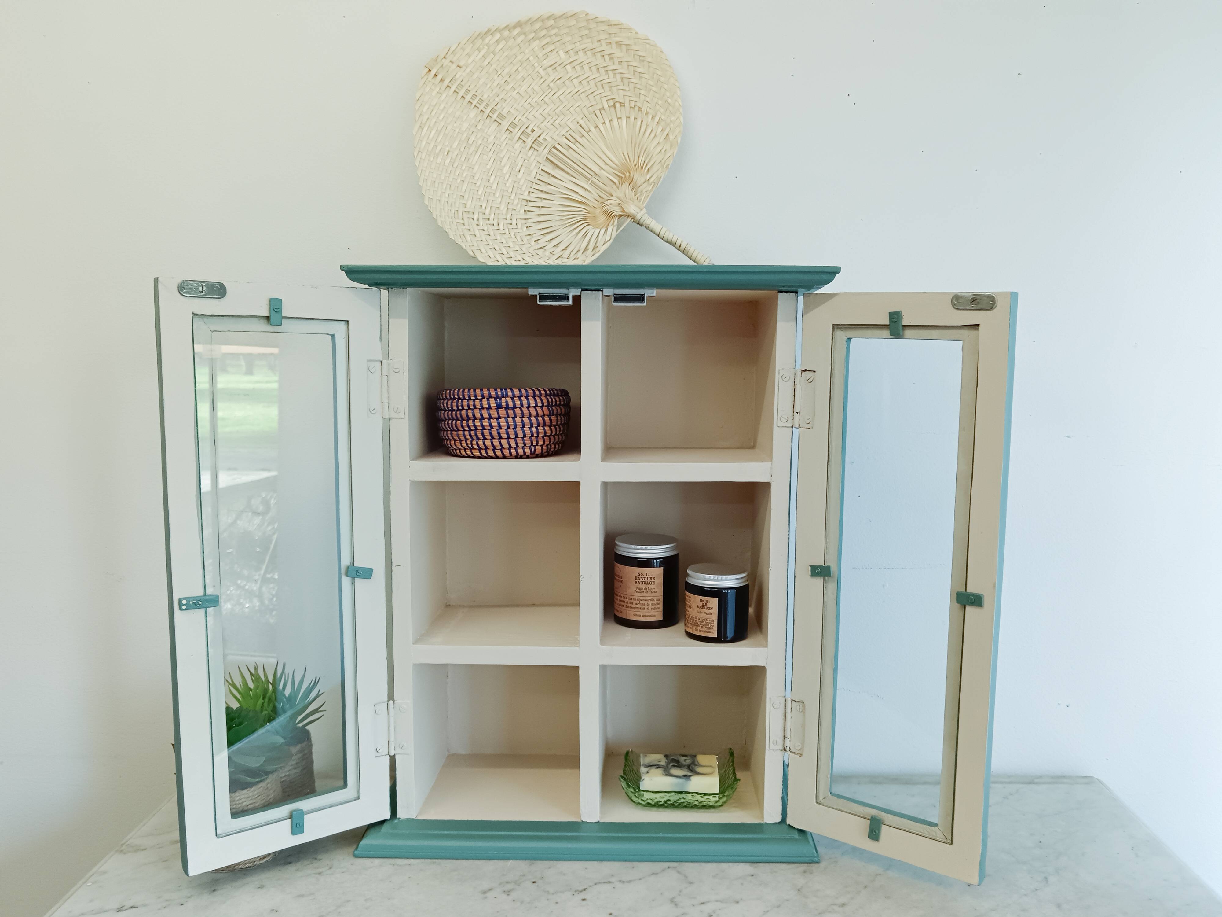 Green and beige 2-door wall display case