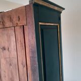 Glass cabinet in green patinated wood