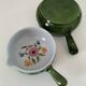Duo of flowery caquelons