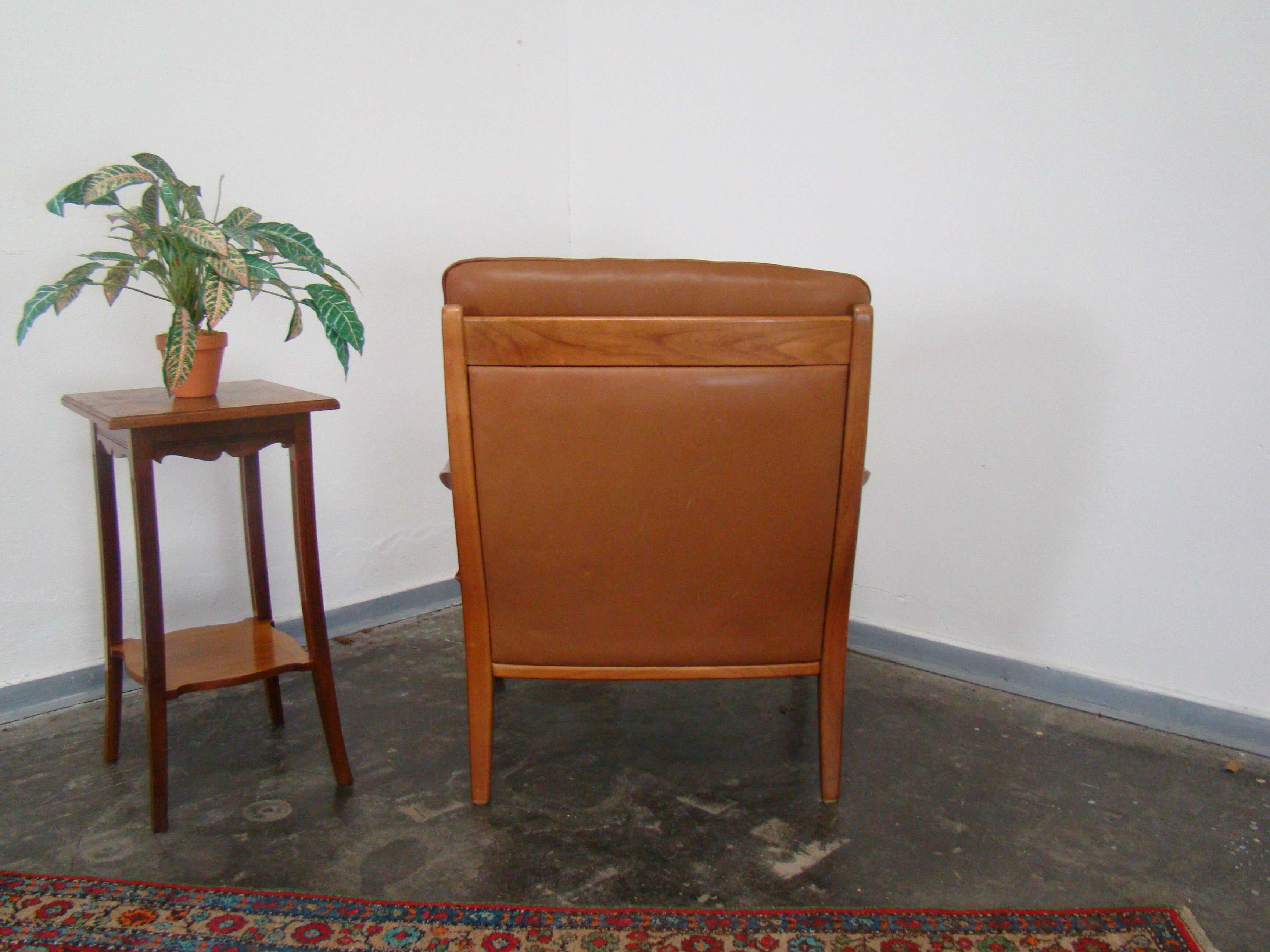 Fauteuil chesterfield en cuir vintage