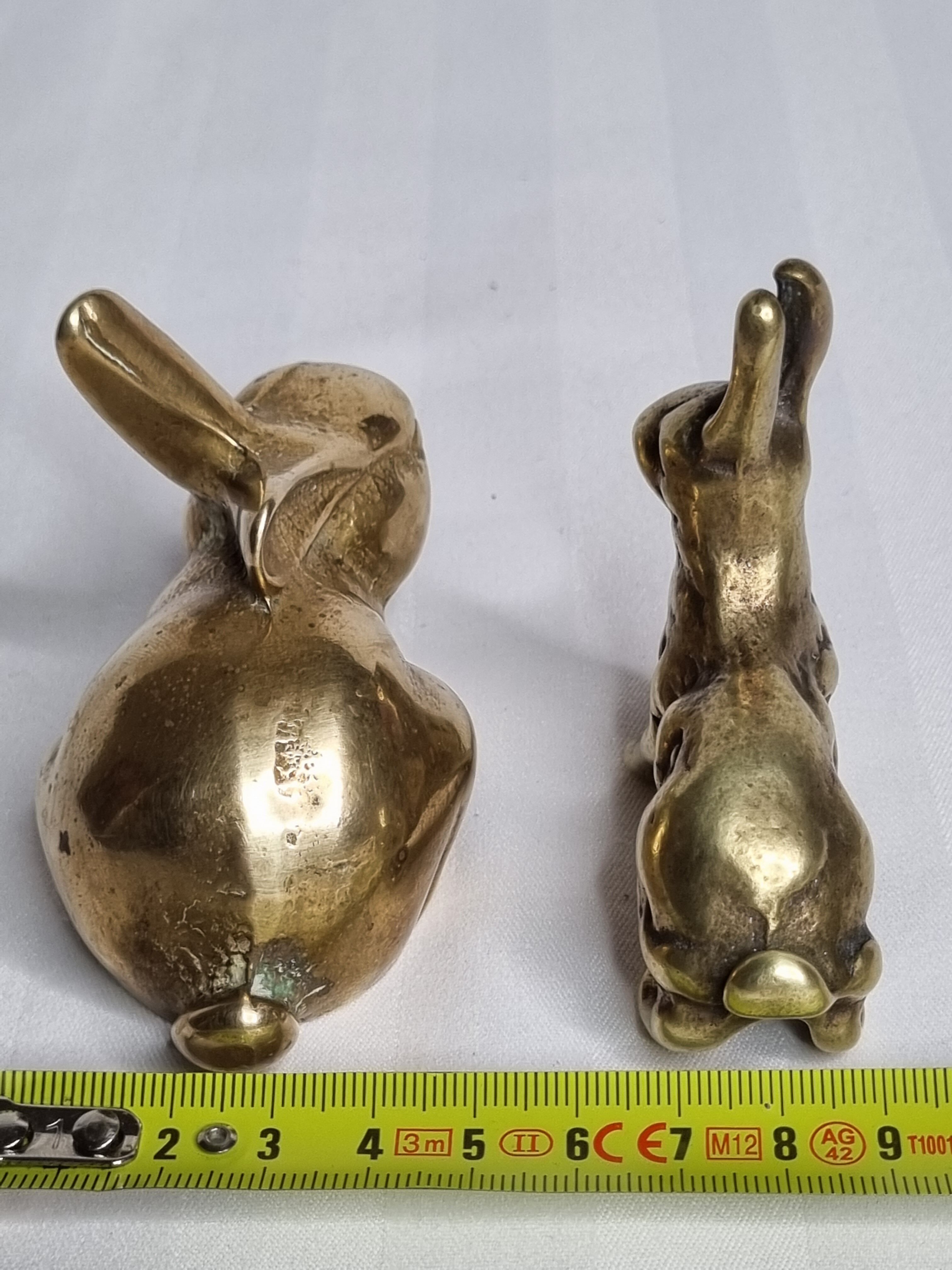 Duo of rabbit and hare in ancient bronze