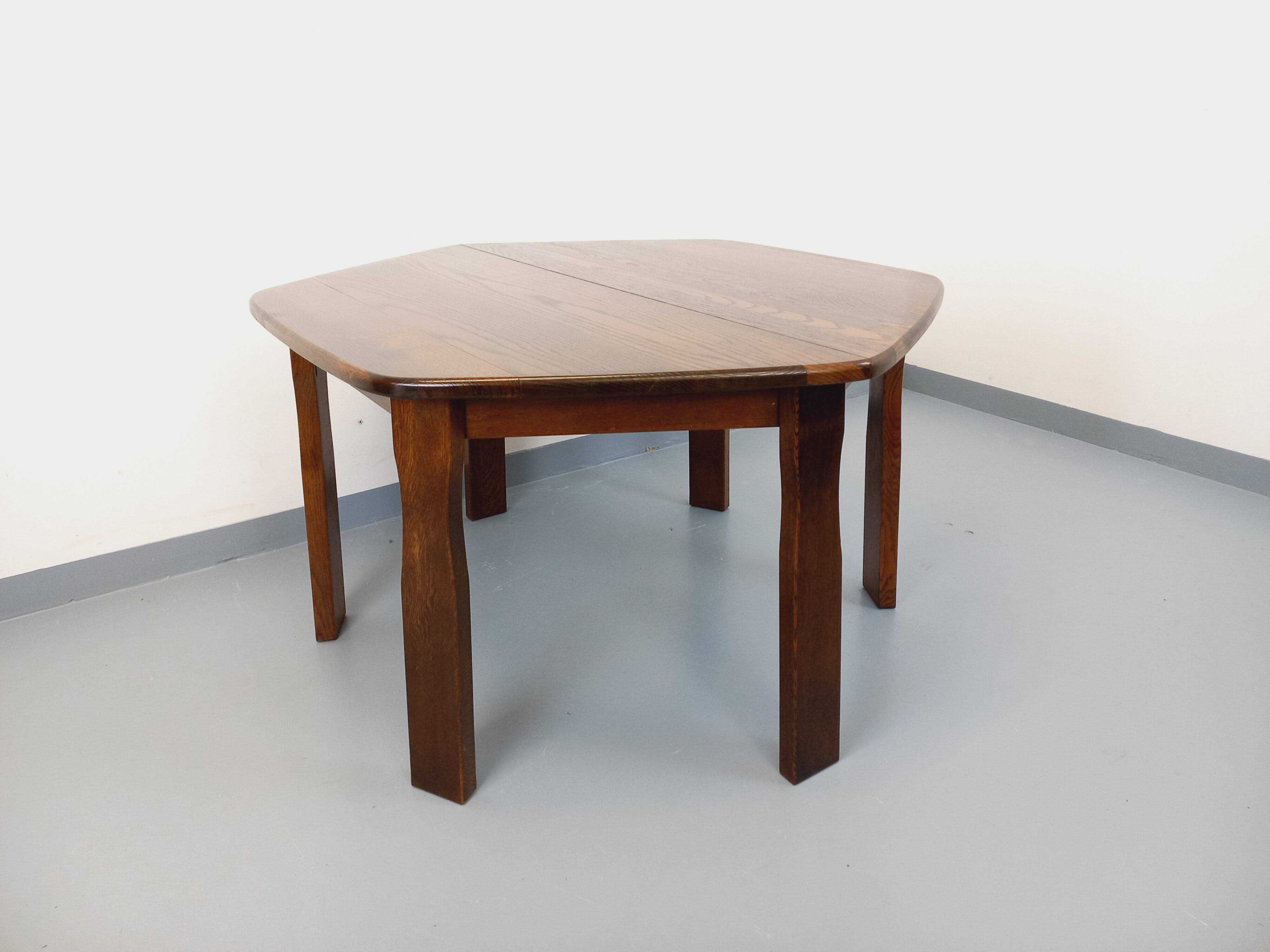 Vintage brutalist hexagonal dining table made of oak from the 1950s.