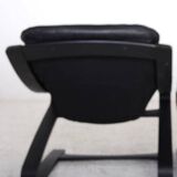 Paire de fauteuils en cuir noir, datant des années 70