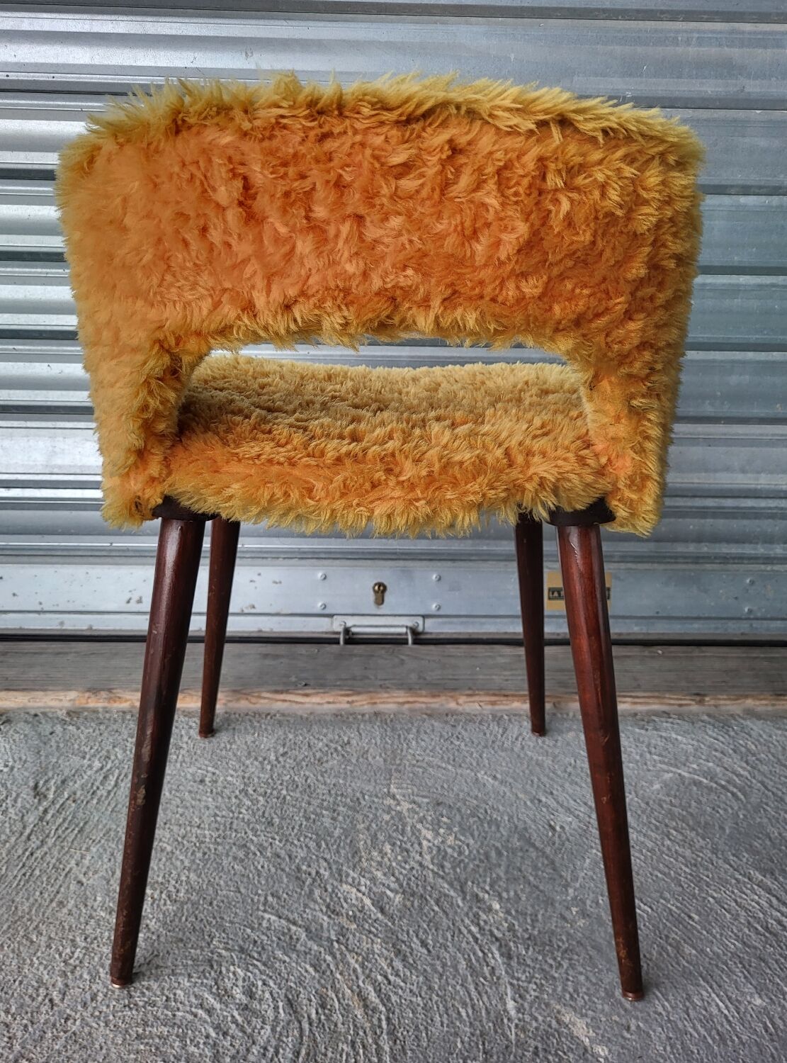 Authentic old vintage furry armchair in good condition