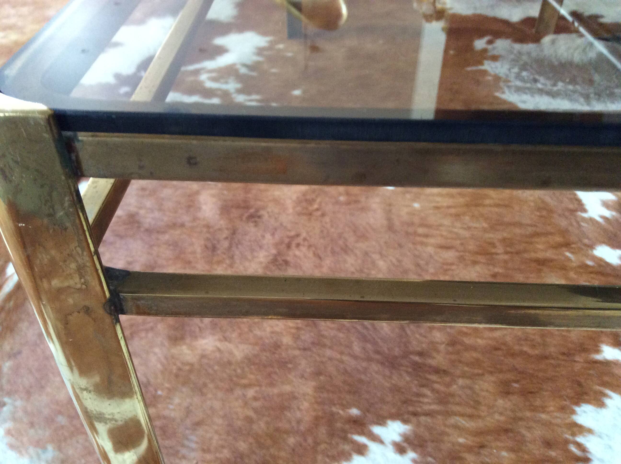 Glass and brass coffee table