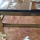Glass and brass coffee table