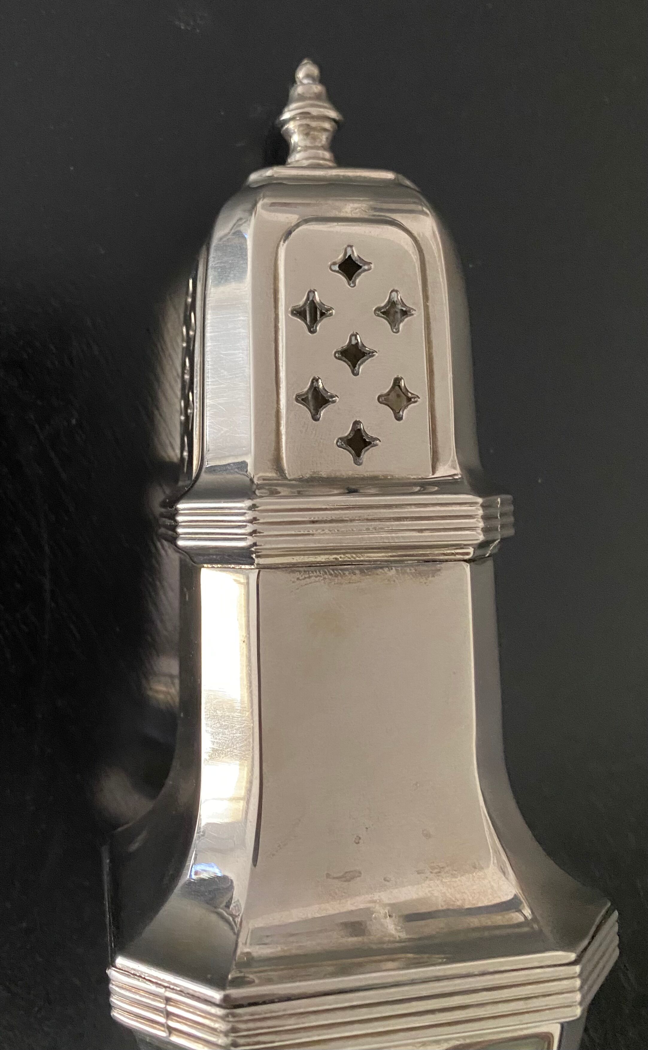 1 silver metal sprinkler