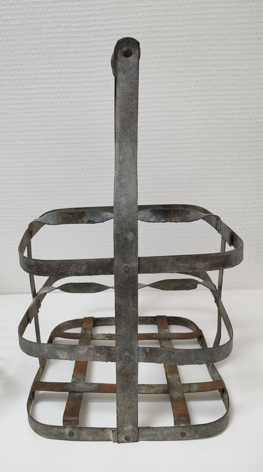 Two baskets metal and patinated wood early twentieth century