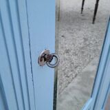 Parisian Art Deco armoire with beveled mirror and painted decoration