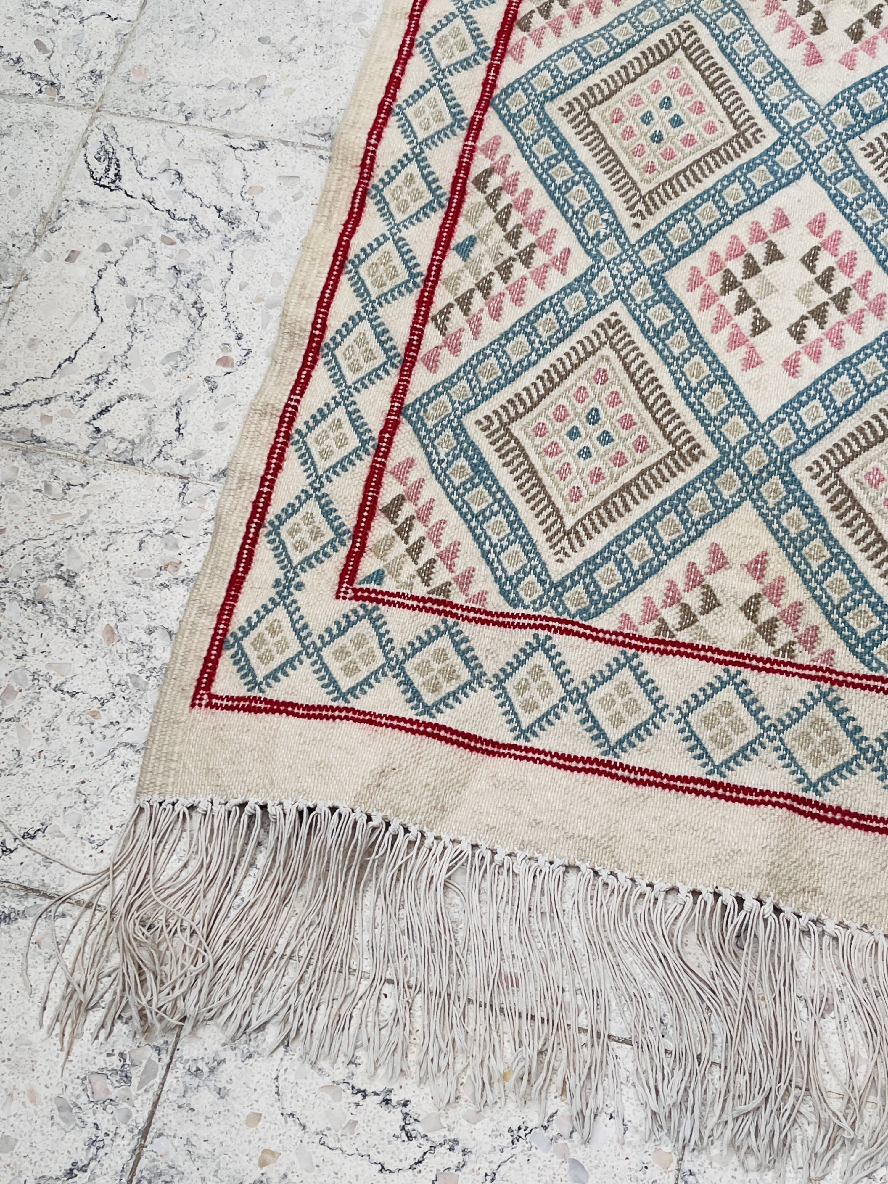 Handmade vintage Tunisian rug
