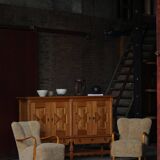 Pair of Mid Century Modern Swedish lounge chairs in birch and lamb's wool, 1960s.