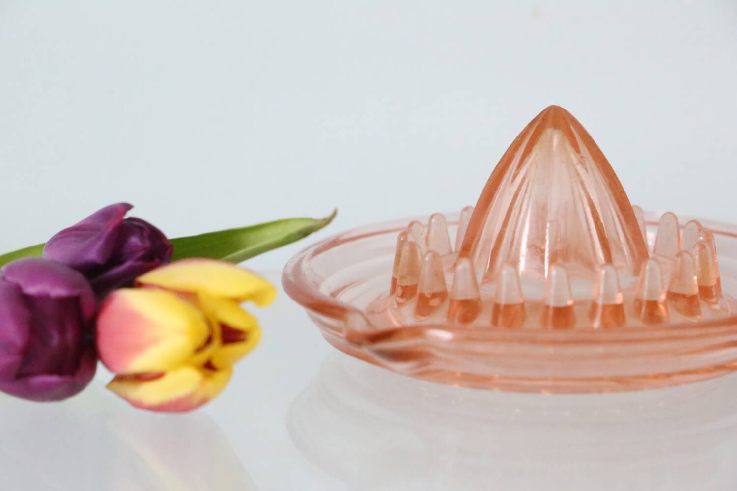 Adorable pink glass juicer