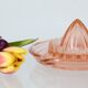 Adorable pink glass juicer