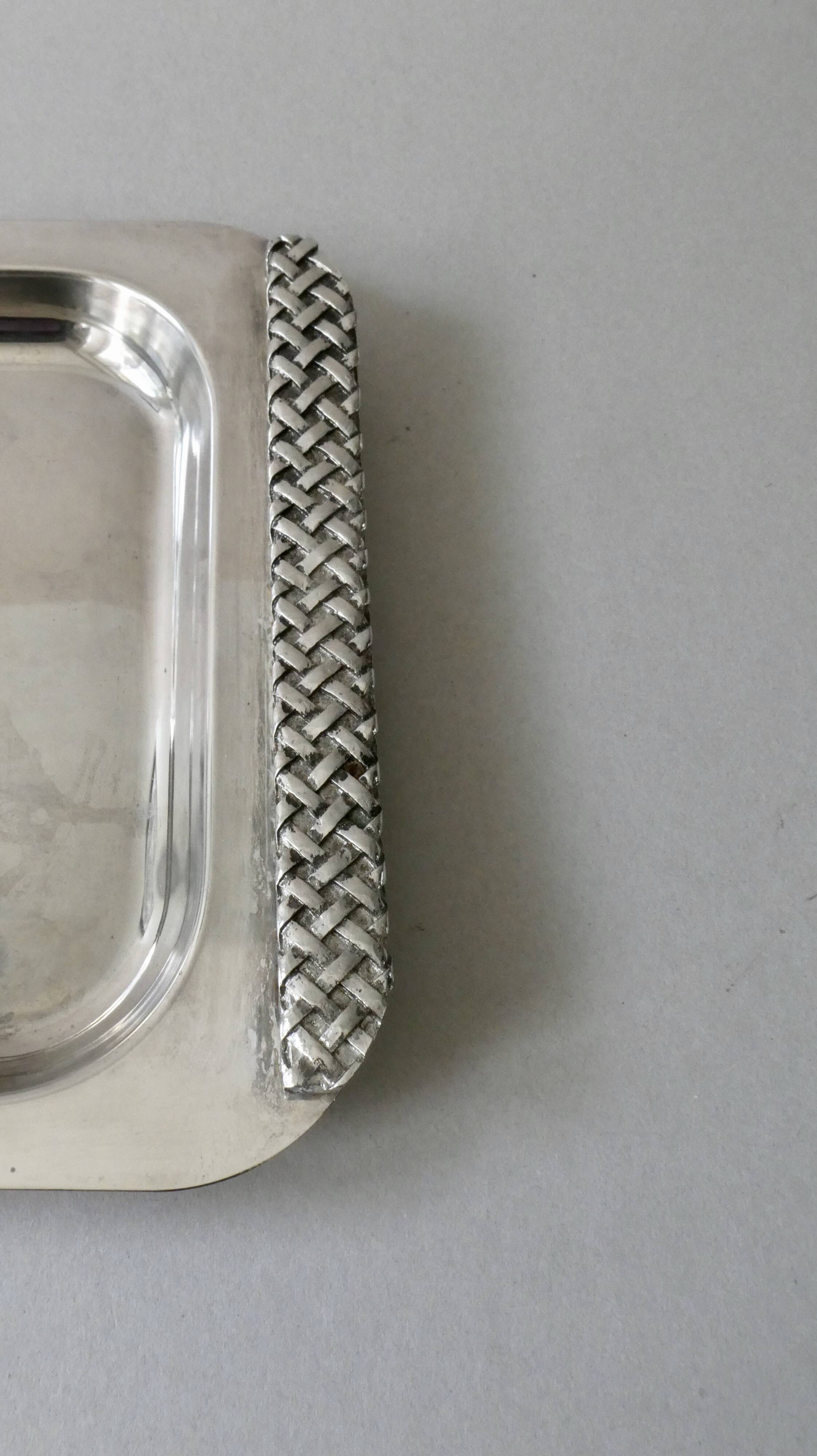 Silver metal tray with braided effect handles