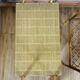 Pair of rattan bedside tables